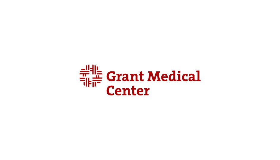 Grant Medical Center: composición geometrizada diferente sobre la cruz médica.